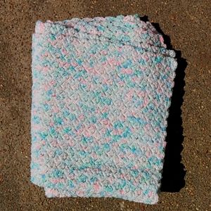 Handed knitted variated color baby afghan. New